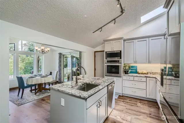 Invite everyone,perfect kitchen with room to entertain in this gorgeous custom cabinetry and designer marble counter tops