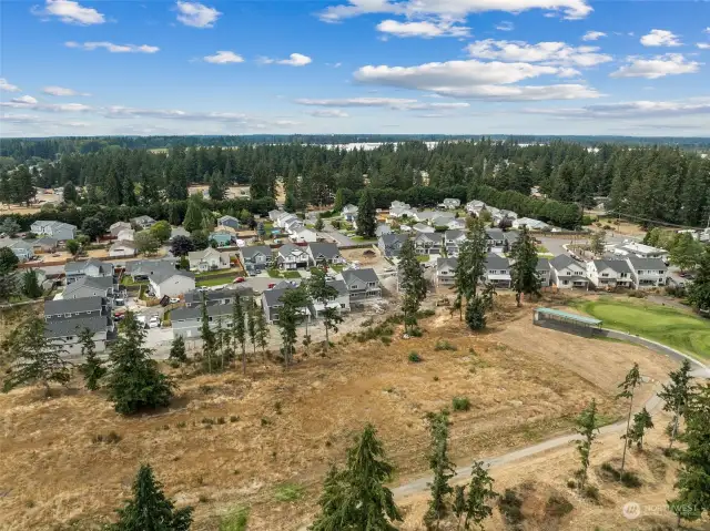 Arial views of the Classics Enclave community overlooking the golf course 8.20.24.