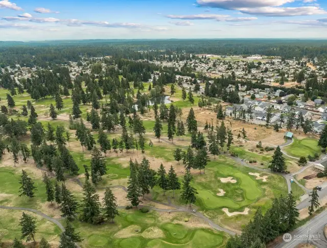 Arial views of the Classics Enclave community overlooking the golf course 8.20.24.