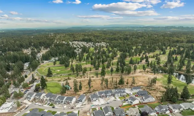 Arial views of the Classics Enclave community overlooking the golf course 8.20.24.