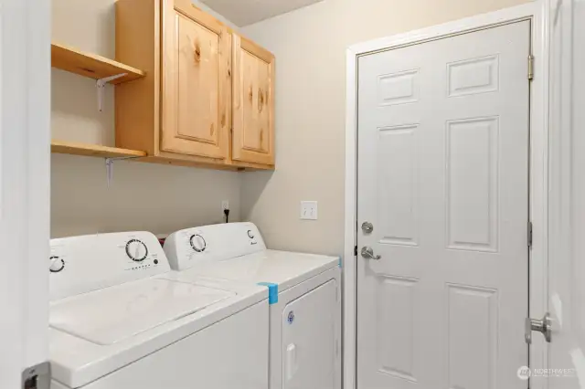 Laundry room leads to spacious 2-car garage