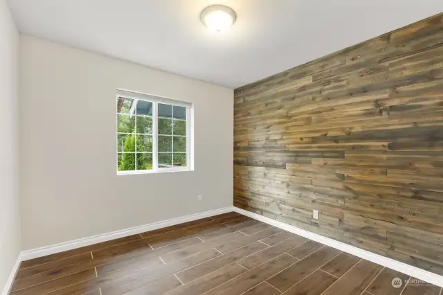 Large bedroom #2 with rustic accent wall