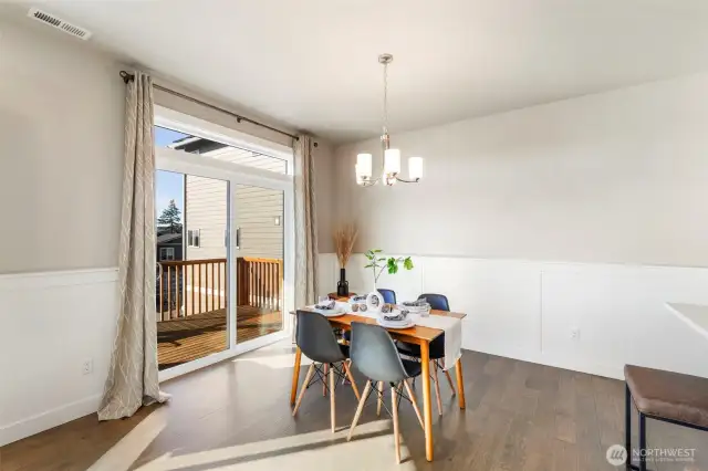 Dining space with access to deck.