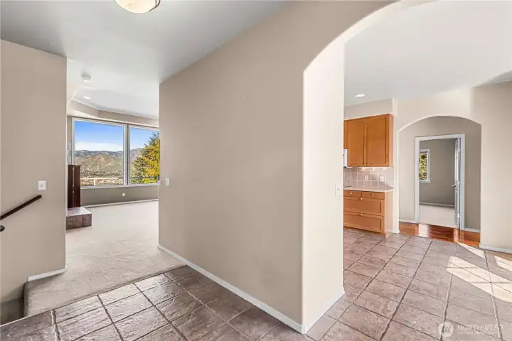 Entry Way to the View! Laundry on the left connected to garage, Kitchen to right