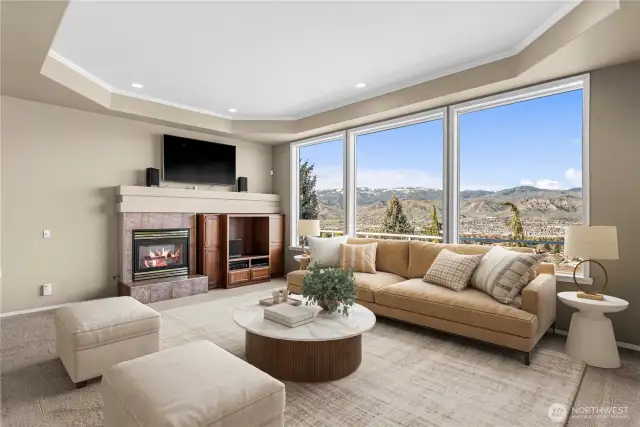 Open living area with gas fireplace. Imagine luxury entertaining or solitude with a view of our Valley.