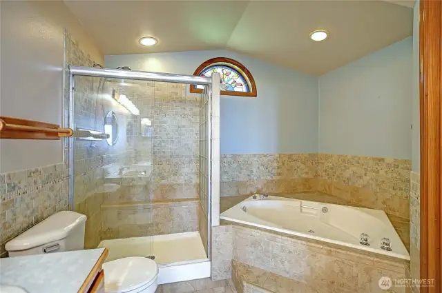 Separate Tiled shower & jetted soaking tub.