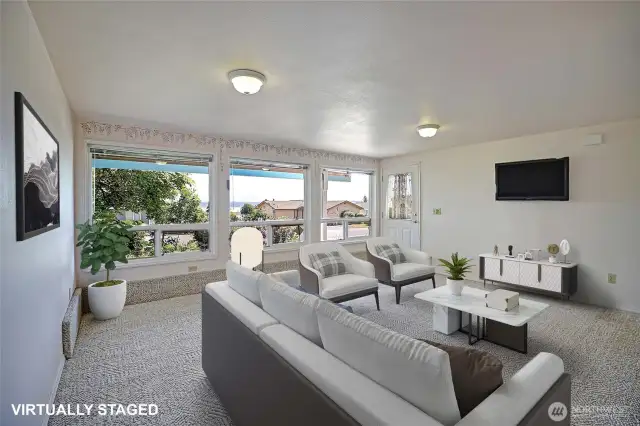Downstairs has it's own separate entrance & would make a great ADU/MIL. Or use it as a family room. It has views too. Virtually staged.