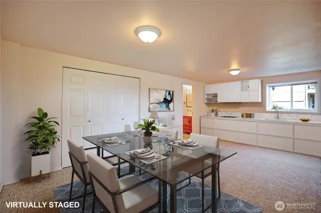The downstairs bonus room would make a great dining & kitchen area. Virtually staged.