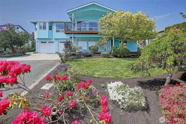 Extra long driveway, RV parking & new tall garage doors. The sellers truck fits inside.