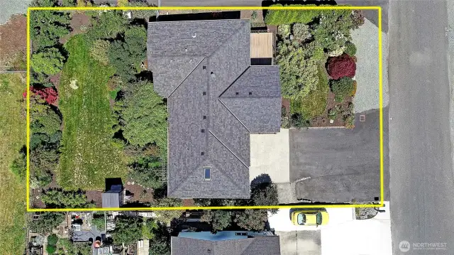 Aerial shot of home showing off the new roof put on in October of 2021.
