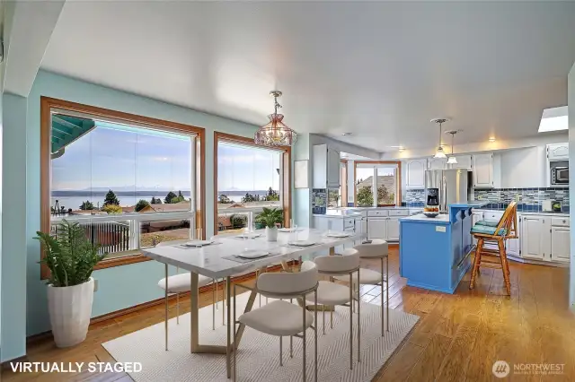 Dining area with more views. Open to the kitchen & living room. Virtually staged.