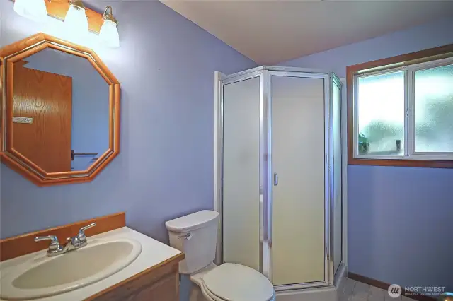 Main floor guest bath w/ shower.