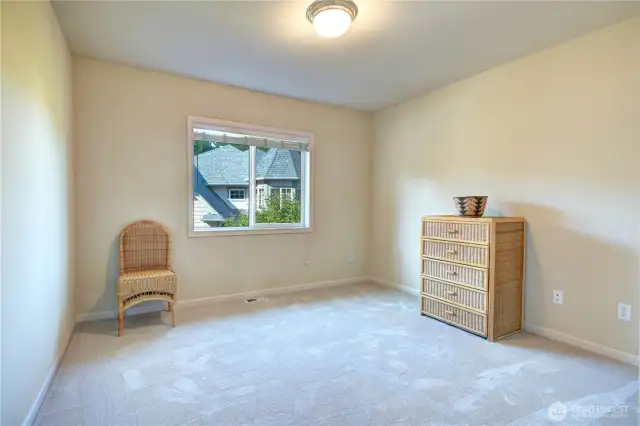 Second guess bedroom upper floor with walk-in closet.