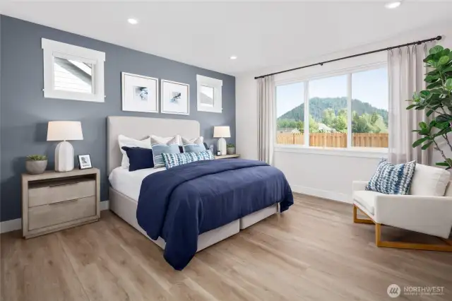 Spacious Primary bdrm. Windows allow alot of natural lighting. All pictures are of model home.  Layout is the same, but materials and colors will vary.