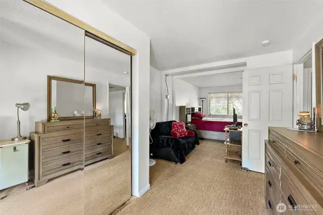 Guest Bedroom 2 w/ Seating Space & Entrance to Balcony