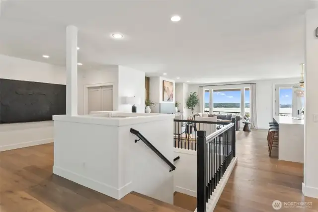 Main Floor with stairs leading to garage level; ELEVATOR/LIFT in background