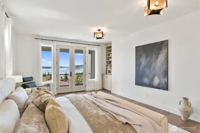 Primary Bedroom with access to deck; built ins and view