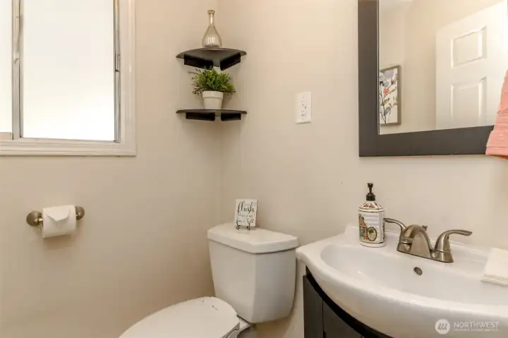 1/2 bath on themain floor off kitchen & laundry area.
