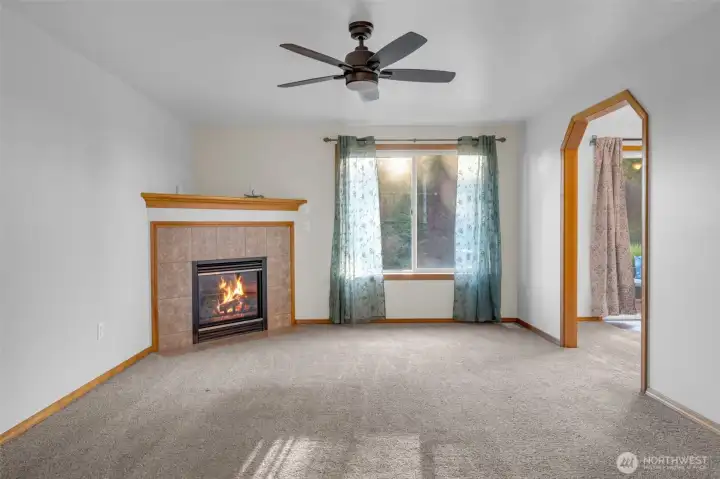 View from entry way- living room w/ gas fireplace