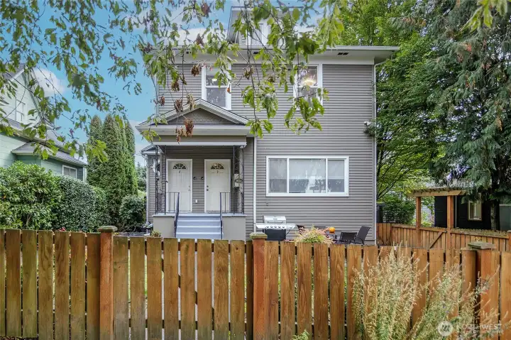 Fenced common area courtyard with community BBQ, perfect for outdoor dining and gathering with friends. Bring out the croquet set!