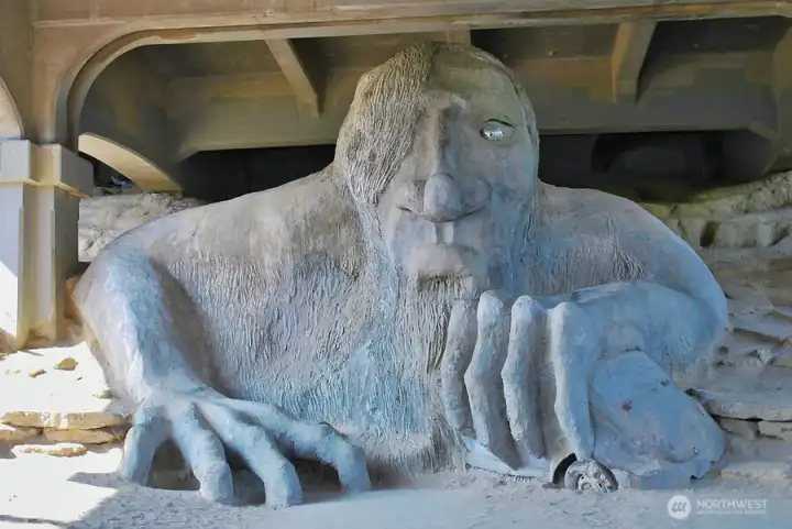 The Fremont Troll sits under the Aurora Bridge, one block from the condo.