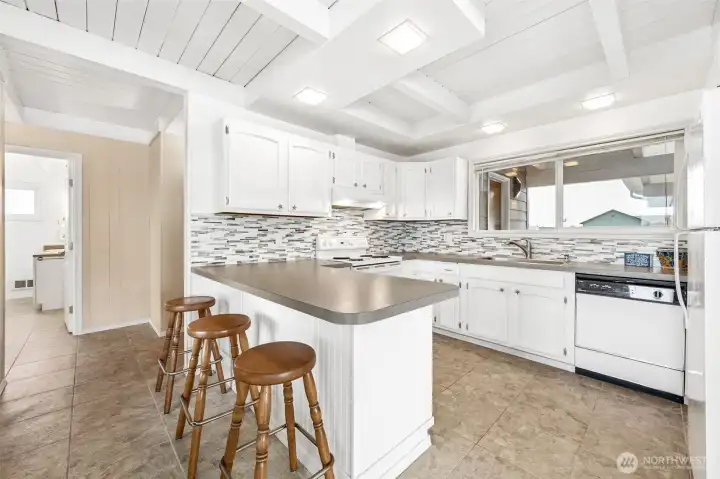 Breakfast bar and lots of counter space.