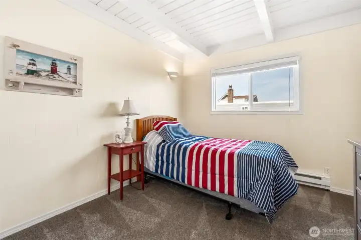 Spacious guest room can easily accommodate a queen size bed.