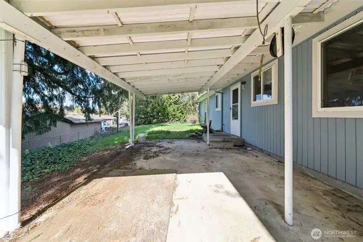 Covered patio in the backyard off the kitchen.