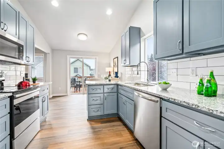 Kitchen with New Stone Counters & Subway Tile