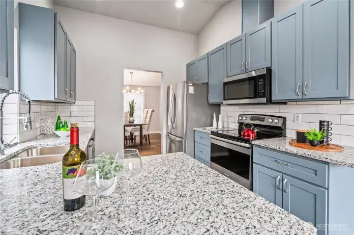 Kitchen Featuring Open to Dining Room