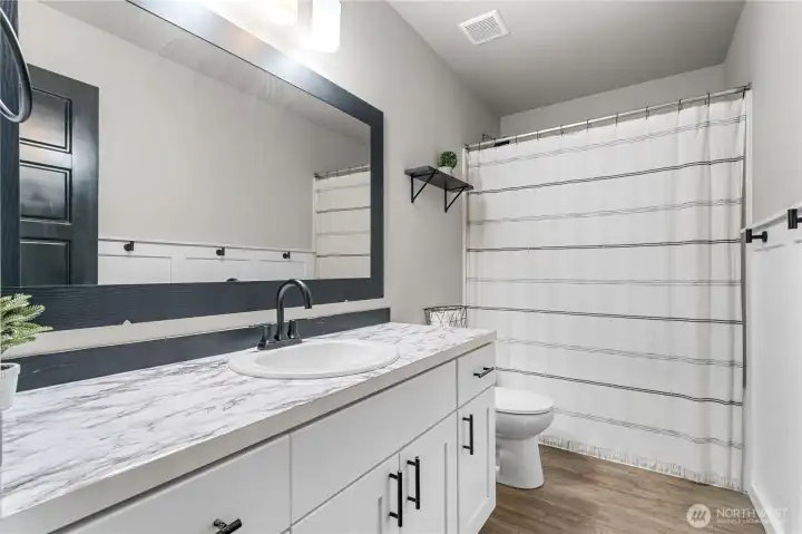 Convienently located hall bathroom