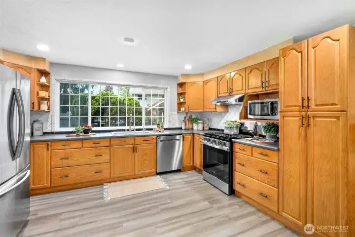 Updated stainless steel appliances in kitchen