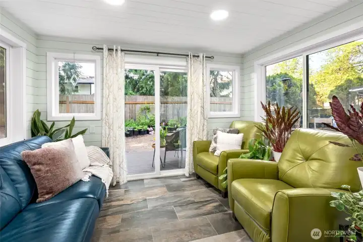 Sun room, perfect for your morning coffee/reading.