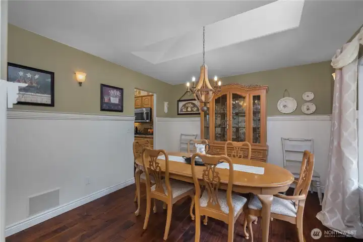Formal dining room with skylight.