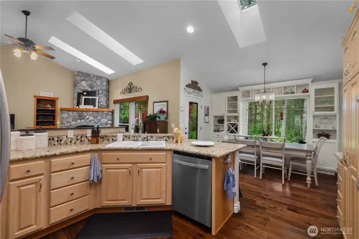 Open and expansive - dining room behind and kitchen nook in front.