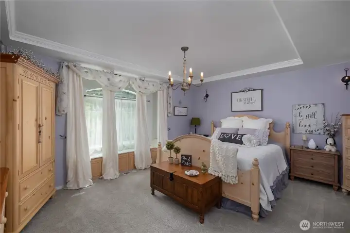 Primary bedroom with cove ceiling.  Large bedroom - see floor plan in supplements.