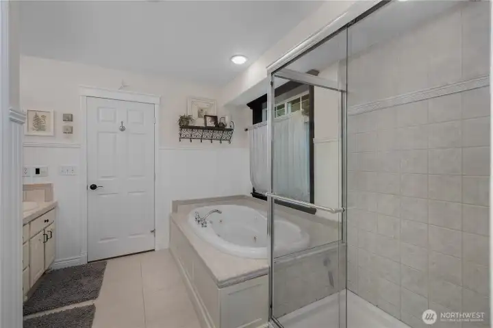 Clean bathroom, double sink, plenty storage and cabinetry and countertops are nice.
