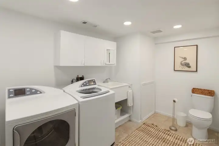 Laundry room and half bath on lower level- ample room to add a shower if desired.