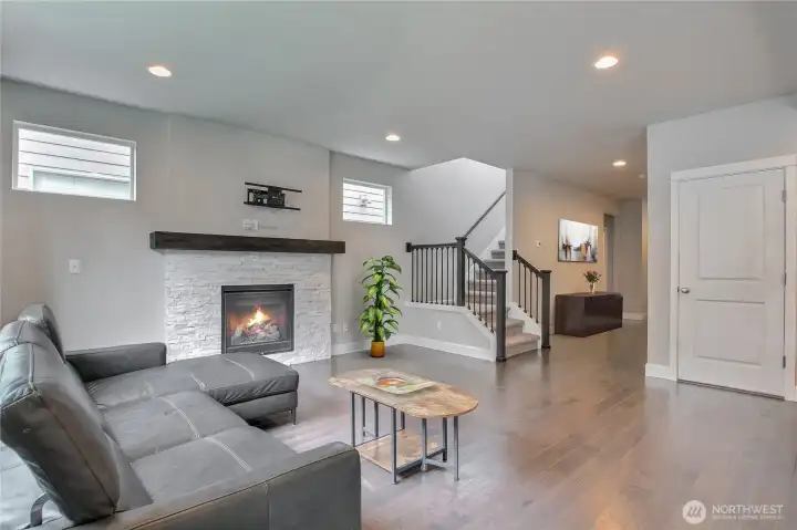 Living room to view of entry Way - virtually staged Living room to view of entry Way - virtually staged