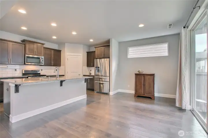 Dining room has accent windows that brining natural lights Dining room has accent windows that brining natural lights