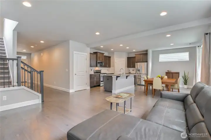 Living room to kitchen view - virtually staged Living room to kitchen view - virtually staged
