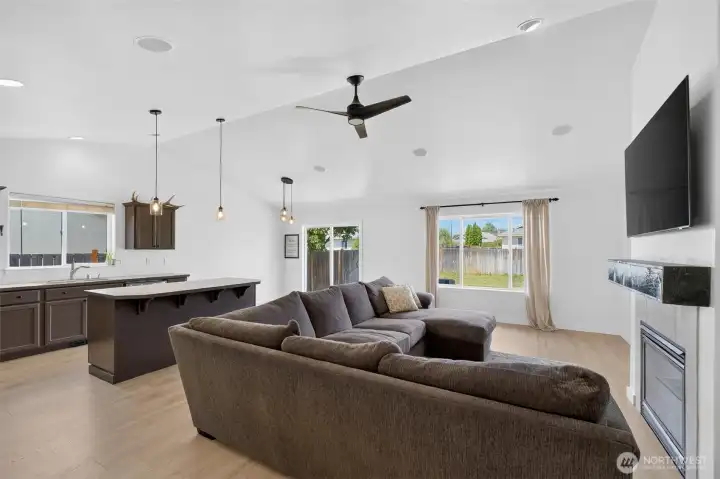 Great room is trulyh great!  Tall ceilings, updated lighting, statement fireplace and more!