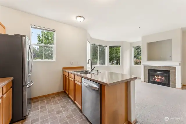 View  from Kitchen to family room. You can see the park from the kitchen and family Rm windows