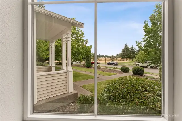 View of Edmond Village Park and open space Family Rm bay window.