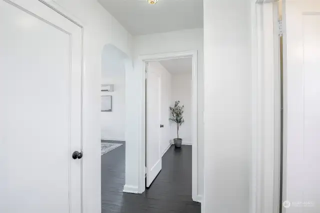 Hallway intersects from all rooms for efficient flow.