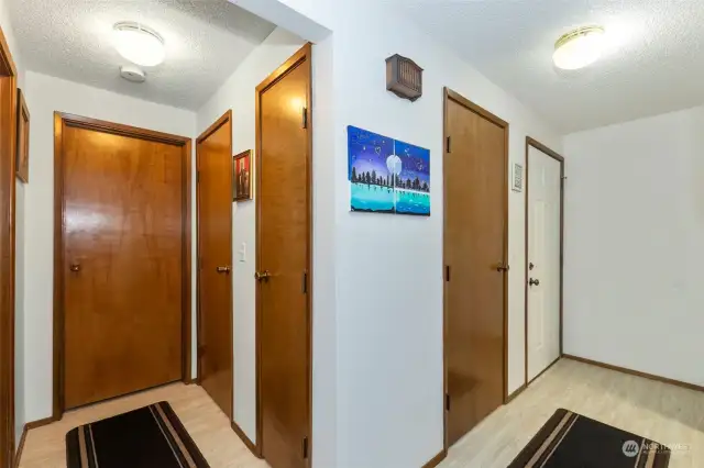 Entryway and hall to bedroom