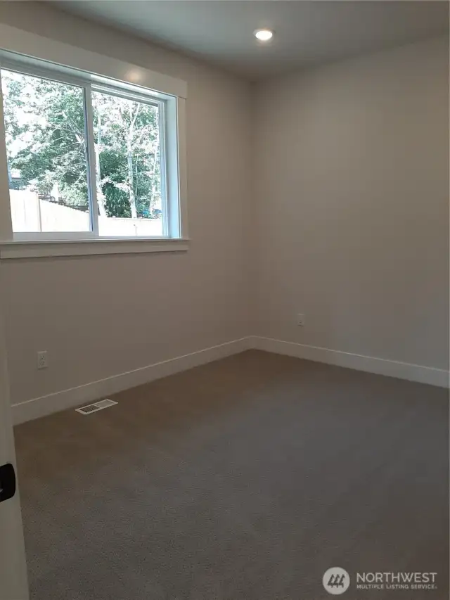 One of three additional light filled bedrooms on the 2nd. floor.