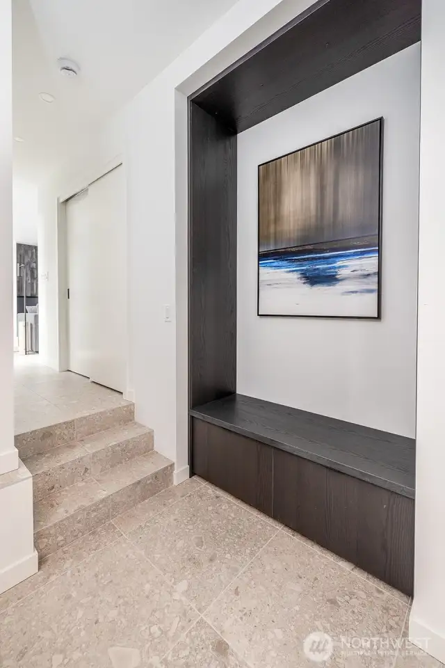 Entryway with built in storage and heated floors