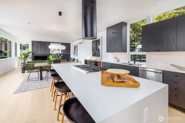 Custom cabinetry and waterfall countertops