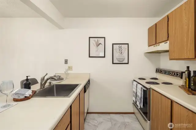 Generous kitchen with lots of storage.